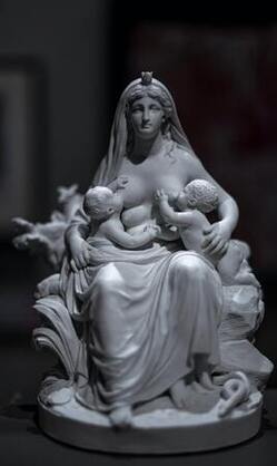 Statue of parent nursing